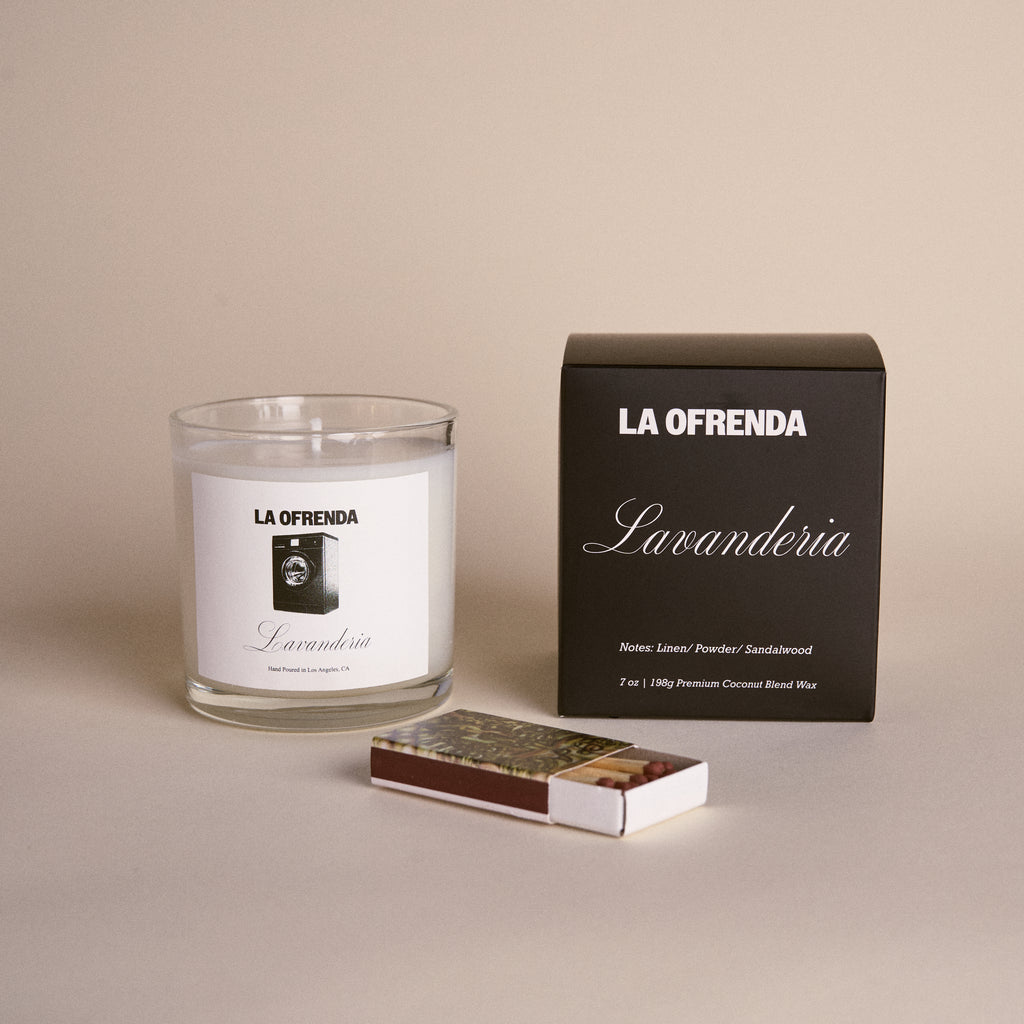 La Ofrenda Lavanderia candle and packaging on a beige background