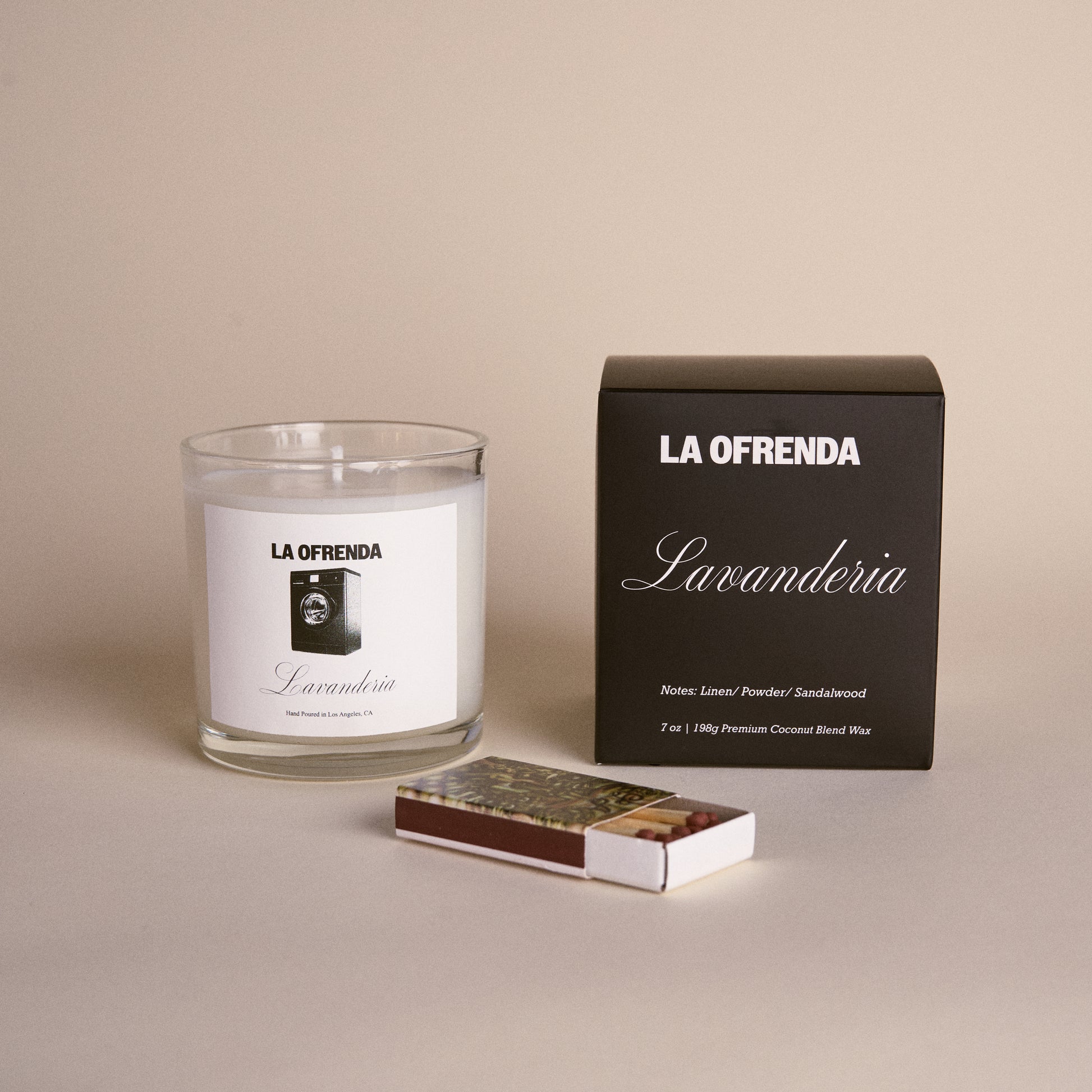 La Ofrenda Lavanderia candle and packaging on a beige background